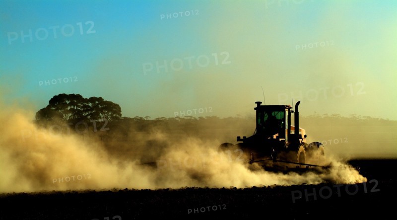 Australia, Western Australia, Wagin, Tractors Ploughing in the Drought