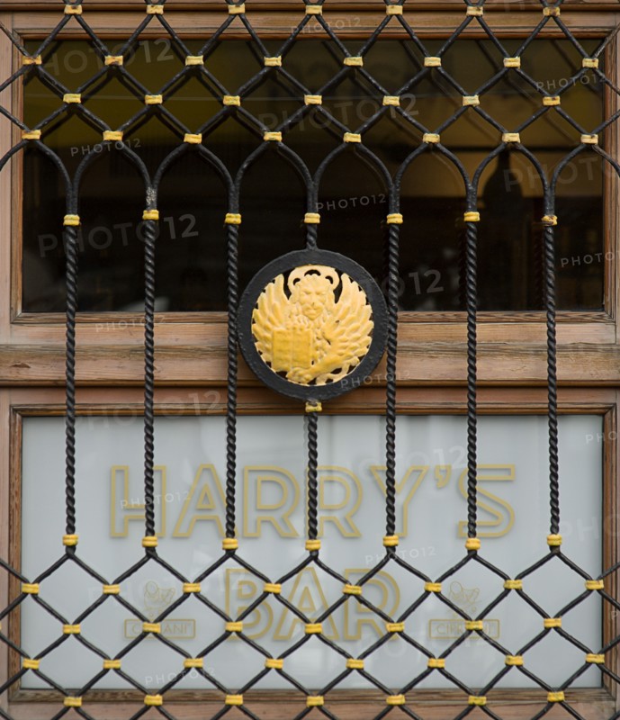ITALY, Veneto, Venice, "A window of Harrys Bar, home of the Bellini cocktail, beside the Grand Canal."