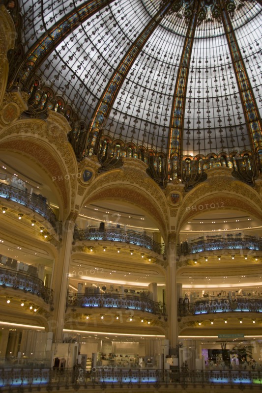 FRANCE, Ile de France, Paris, Opera Quarter. The central circular area under the glass dome of the Art Nouveau department store Galleries Lafayette