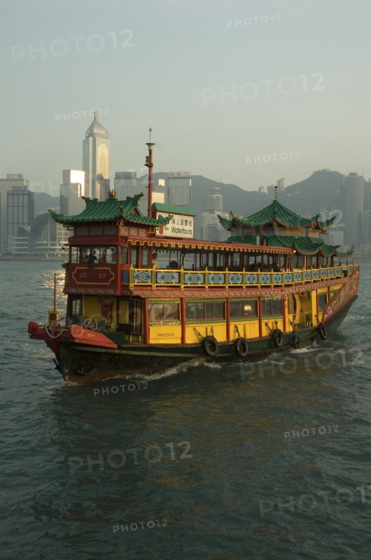 CHINA, Hong Kong, Hong Kong, Tourist boat and Victoria Island skyline