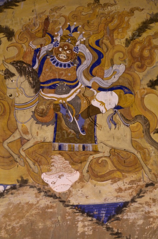 INDIA, Ladakh, Tikse Gompa, Fresco on Buddhist monastery wall depicting Guru Padmasambhava the founder of Tibetan Buddhism.