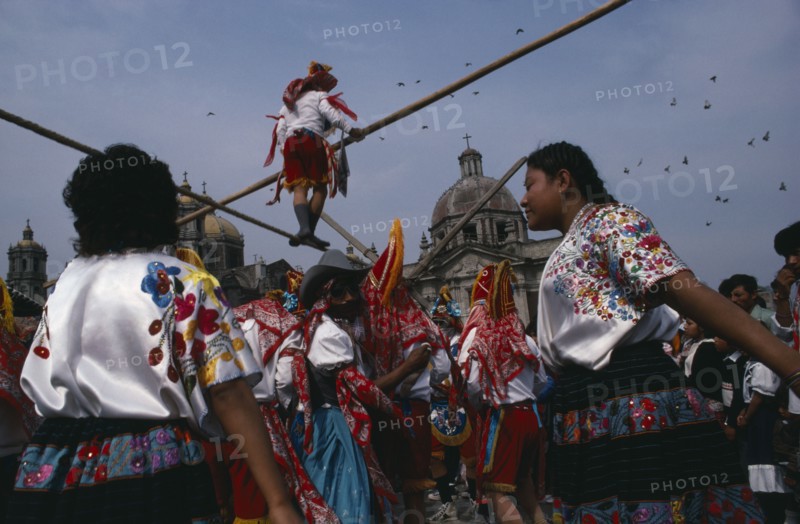 MEXICO, Mexico City, "Our Lady of Guadelope Festival dancers, musicians and acrobats in front of the Basilica."