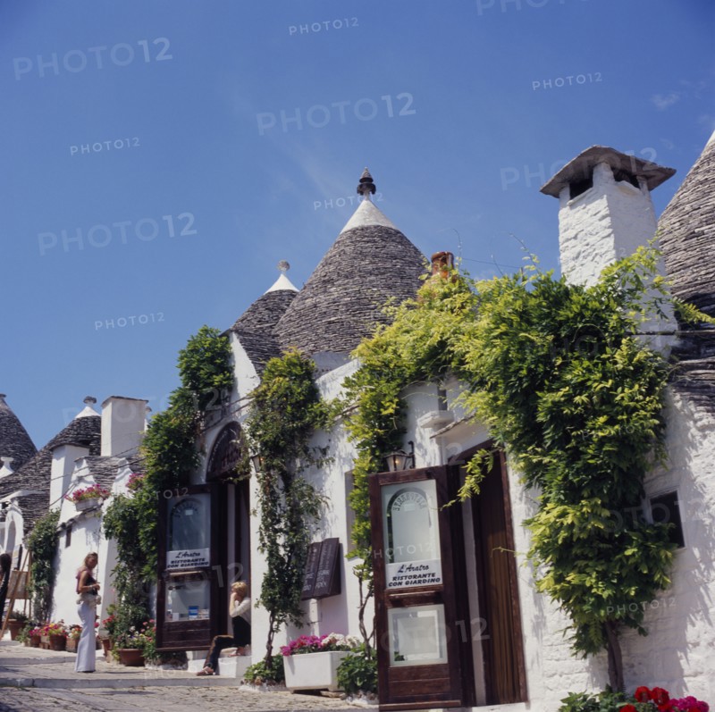 ITALY, Puglia, Alberobello, Traditional Trulli houses.