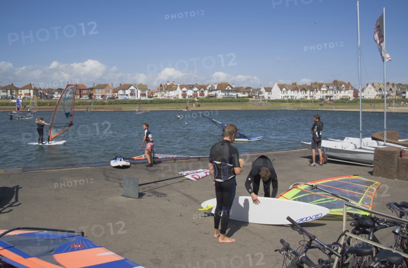 ENGLAND, East Sussex, Brighton, Hove lagoon with windsurfers