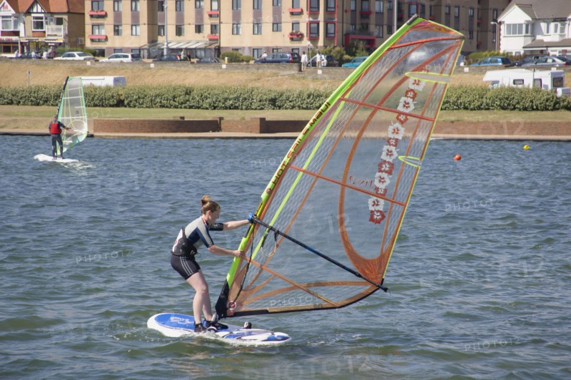 ENGLAND, East Sussex, Brighton, Hove lagoon with windsurfers