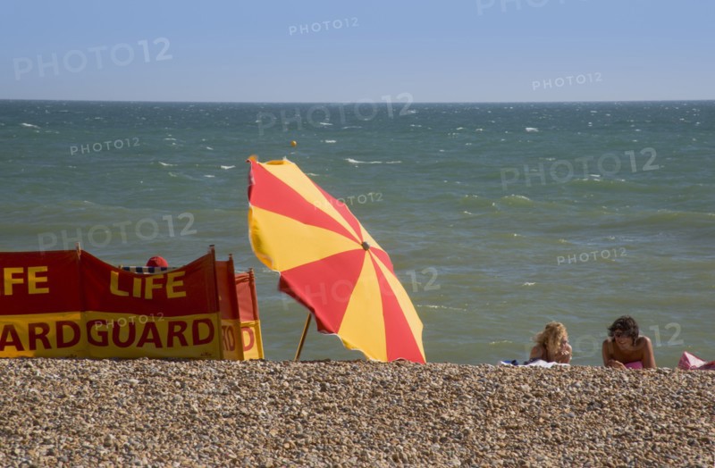 ENGLAND, East Sussex, Brighton, Life guard station on the beach.