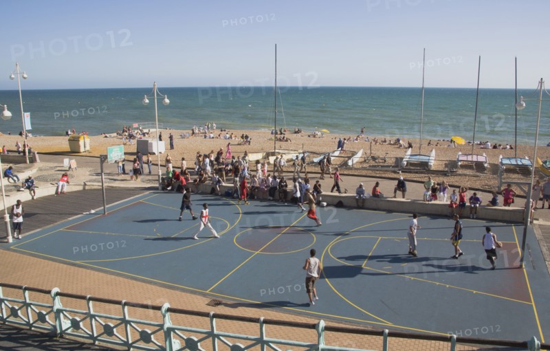 ENGLAND, East Sussex, Brighton, Basketball court on the seafront.