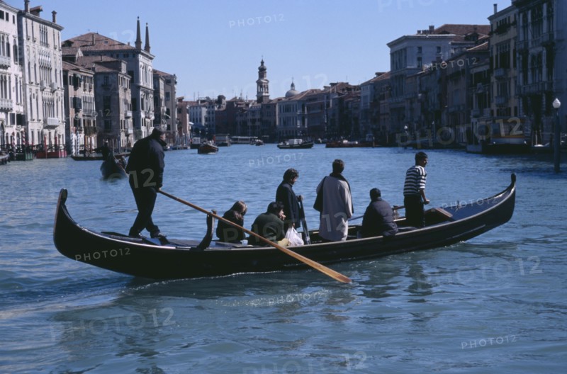 ITALY, Venezia, Venice, Grand Canal. Traghetti ferrying passengers across the canal.