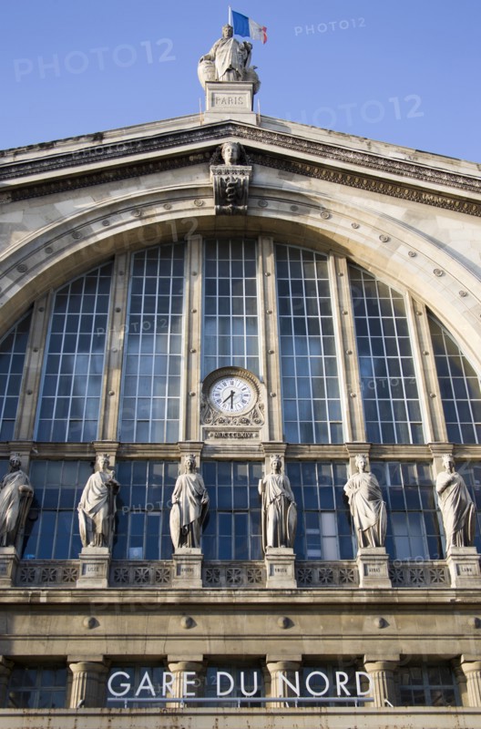 FRANCE, Ile de France, Paris, The front of the Gare du Nord railway station with statues and clock
