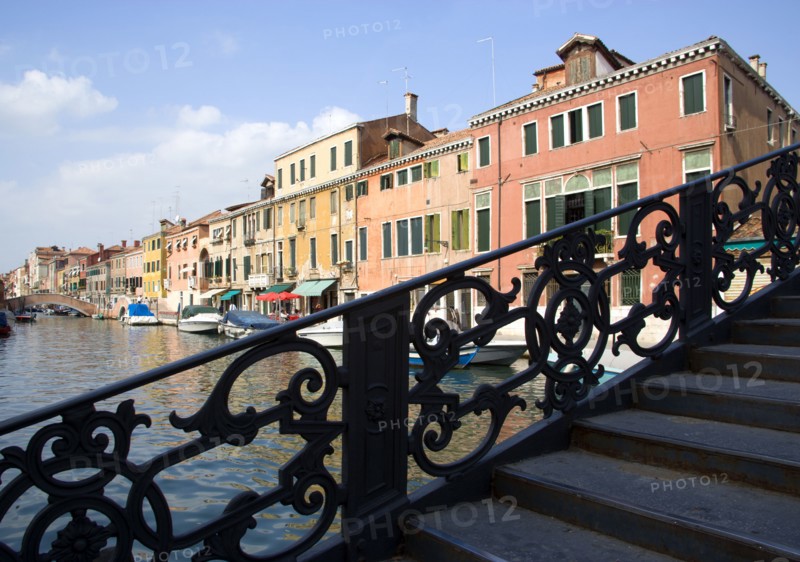 ITALY, Veneto, Venice, A wrought iron bridge heading north out of the Ghetto Novo onto Fondamenta Degli Ormesini in Cannaregio district