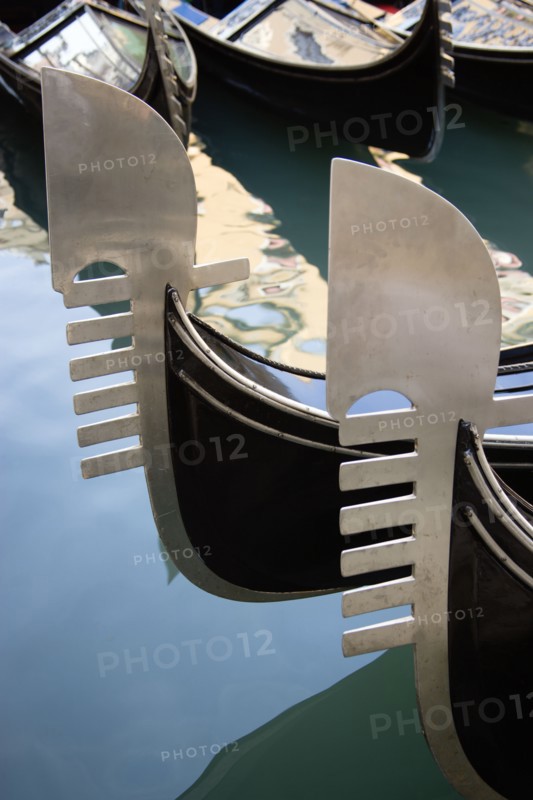 ITALY, Veneto, Venice, Ferros or bows of moored gondolas