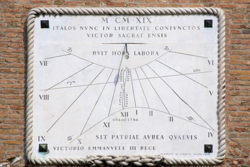 ITALY, Veneto, Venice, A sundial on the wall of the Arsenal with year in Roman numerals and words in Latin