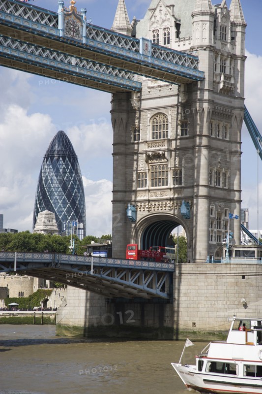 ENGLAND, London, Detail of  Tower Bridge on the River Thames with the Gherkin tower seen through the bridge.