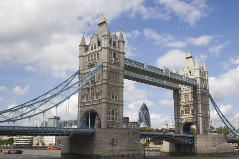 ENGLAND, London, Detail of  Tower Bridge on the River Thames with the Gherkin tower seen through the bridge.
