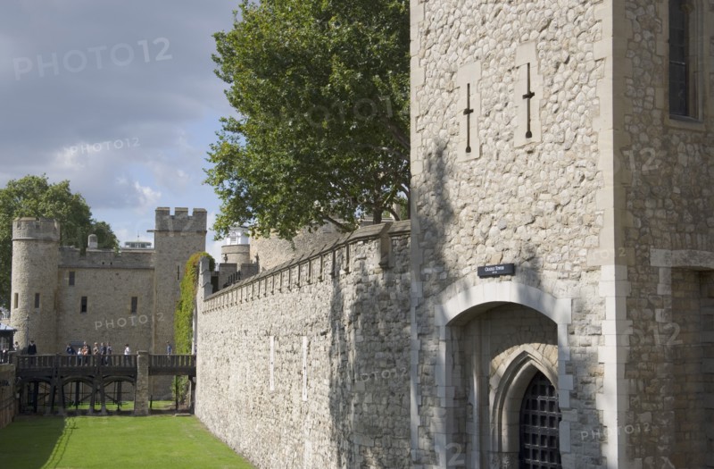 ENGLAND, London, The Tower of London showing moat and battlements.