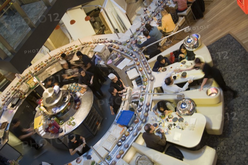 ENGLAND, Kent, Greenhithe, "Bluewater shopping mall, Yo Sushi conveyor Japanese restaurant."
