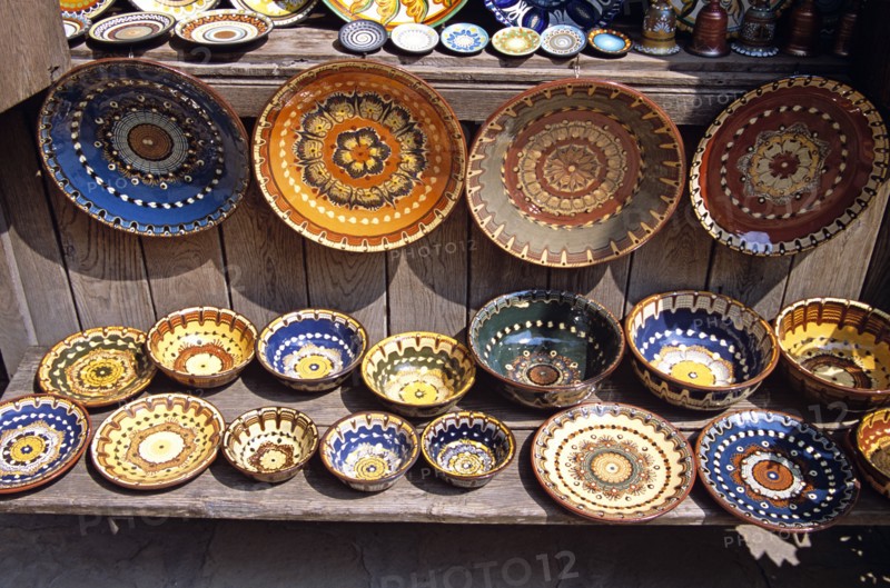 BULGARIA, Veilko Tarnovo, Traditional Bulgarian pottery on display outside gift and craft shop.