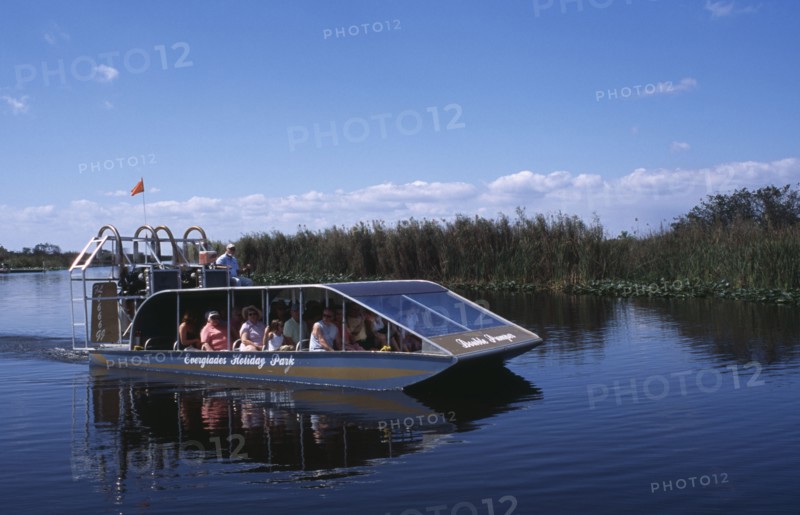 USA, Florida, Fort Lauderdale, Tourists Air boating in the Everglades National Park