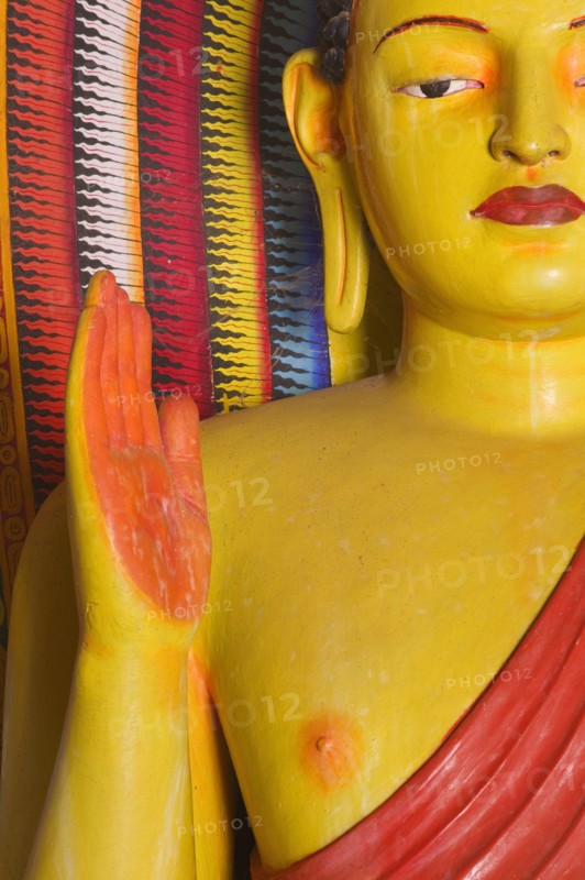 SRI LANKA, Anuradhapura, Detail of a Buddha statue in Isurumuniya Vihara (Rock Temple).