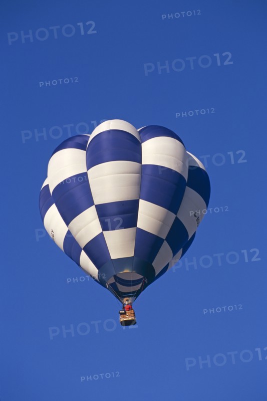ENGLAND, Bristol, Blue and white checked hot air balloon.