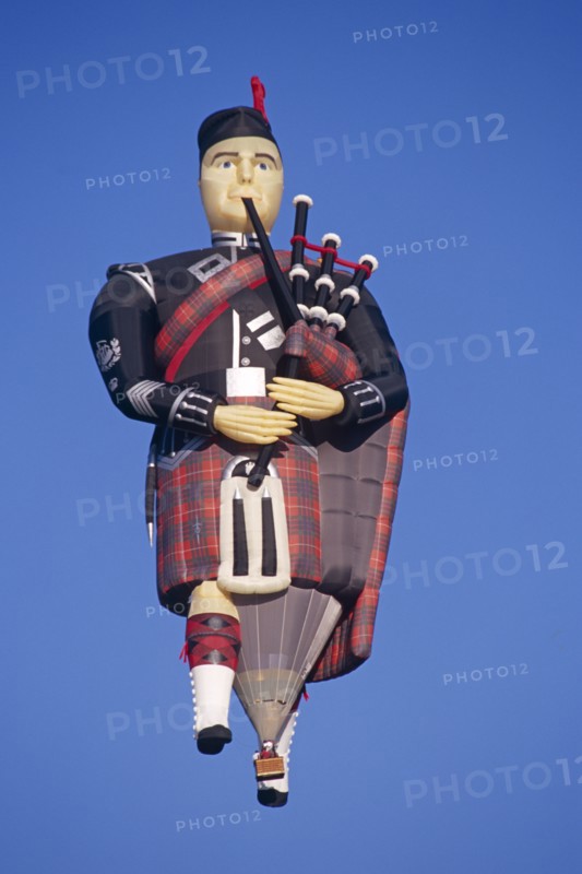 ENGLAND, Bristol, "Scotsman playing bagpipes hot air balloon,"