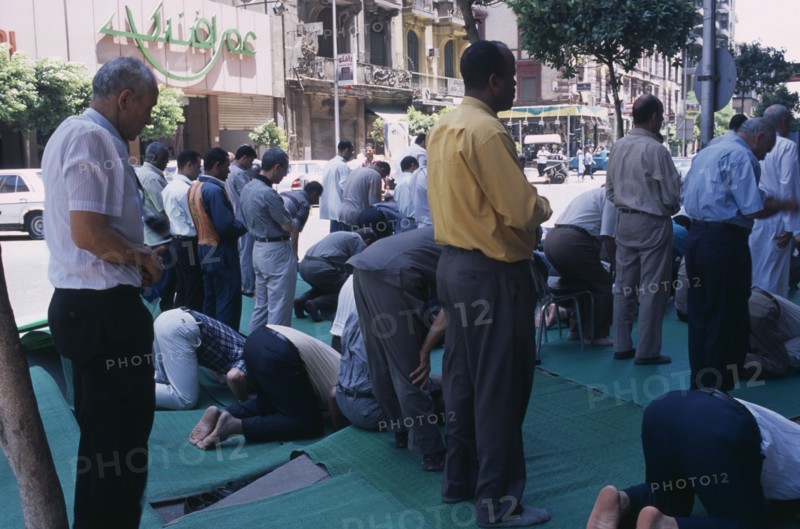 EGYPT, Cairo Area, Cairo, Men taking part in Friday Prayers