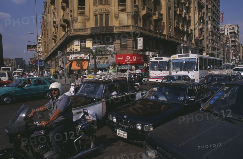 EGYPT, Cairo Area, Cairo, "Busy road with traffic including buses, taxis and motorbikes"