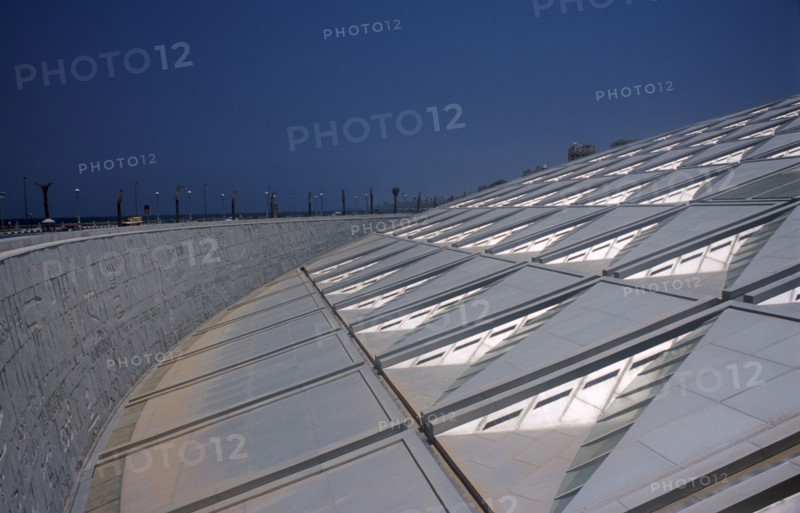 EGYPT, Nile Delta, Alexandria, "Bibliotheca Alexandrina modern library with detail of  interlocking panelled roof and walls made of grey Aswan granite carved with letters, characters and symbols from every known alphabet in the world. "
