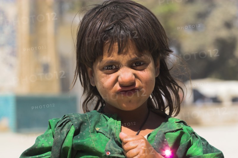 AFGHANISTAN, (Mother of Cities), Balkh, "Shrine of Khwaja Abu Nasr Parsa, Local girl Built by Sultan Husayn Bayqara in late Timurid style in the 5th Century and dedicated to a famous theologian who died in Balkh in 1460. The dome was badly damaged in an earthquake in the 1990's, and hit by rocket during factional fighting in 2003"