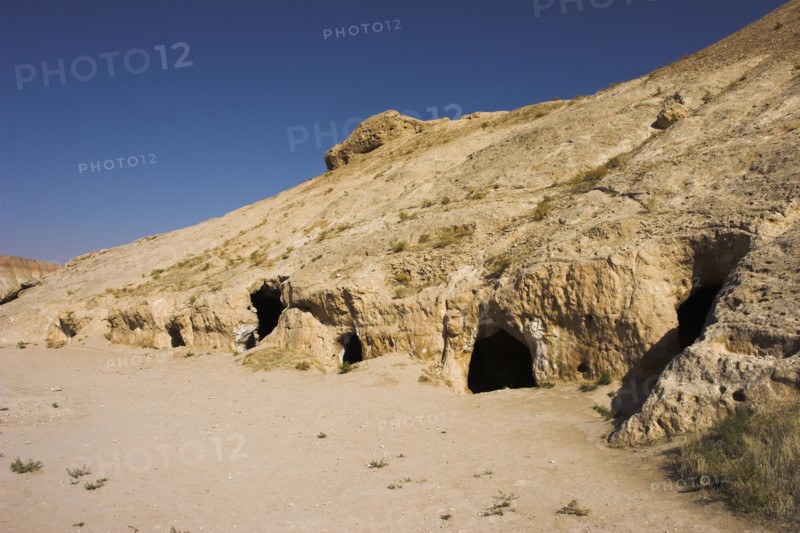 AFGHANISTAN, Samangan Province, Takht-I-Rusam, "2km south of the centre of Haibak, Buddhist caves know as Takht-I-Rusam (Rustam's throne), part of a stupa-monastery complex caeved from rock dating from the Kushano-Sasanian period 4th-5th century AD.