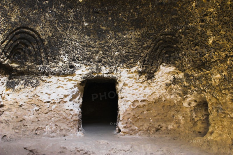 AFGHANISTAN, Samangan Province, Takht-I-Rusam, "2km south of the centre of Haibak, Buddhist caves know as Takht-I-Rusam (Rustam's throne), part of a stupa-monastery complex carved from rock dating from the Kushano-Sasanian period 4th-5th century AD. Inside cave 4 thought to be a bathroom