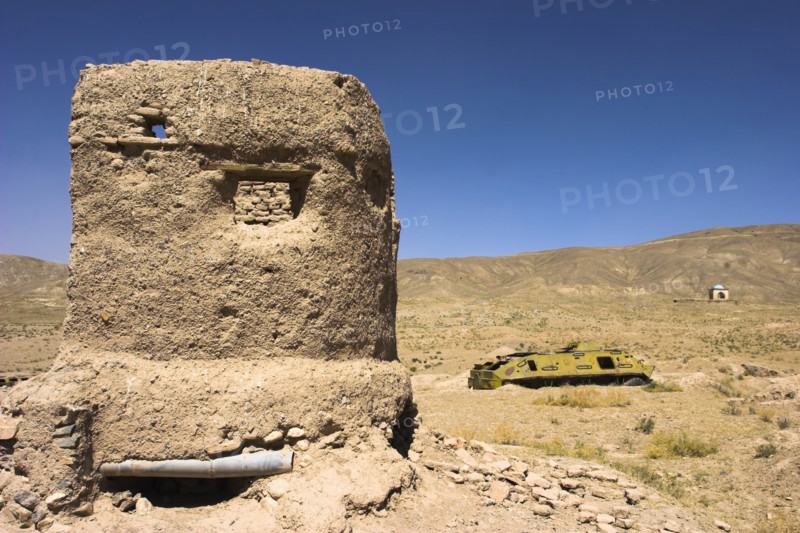 AFGHANISTAN, Ghazni, "Small tower which had been dug out as a bunker near Minarets built by Sultan Mas'ud111 and Bahram Shah served as models of the Minaret of Jam with square Kufic and Noshki script, Mounds at the foot of both minarets indiate they were once a part of two large buildings,archchaeologists believe these building were mosques Jane Sweeney"