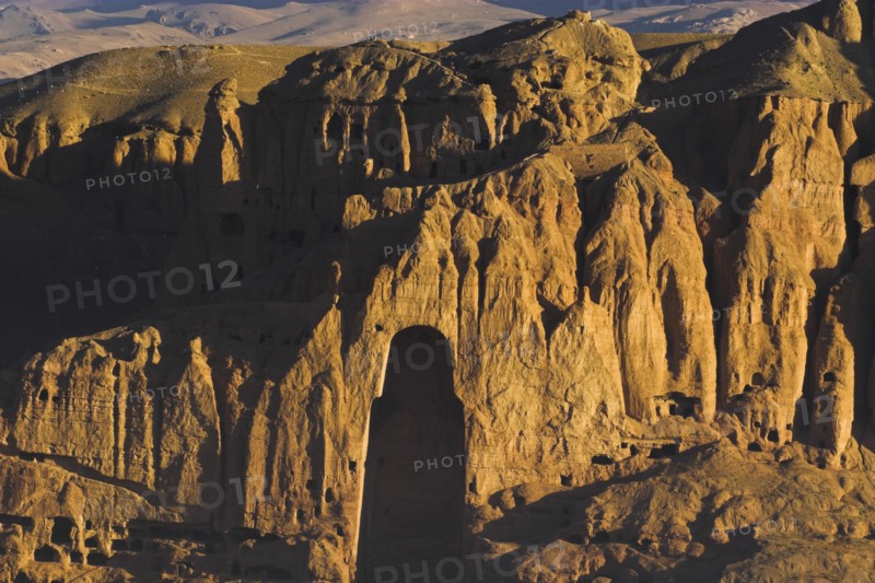 AFGHANISTAN, Bamiyan Province, Bamiyan, View of Bamiyan valley showing cliffs with empty niche where the famous carved Budda once stood (destroyed by the Taliban in 2001)