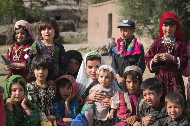 AFGHANISTAN, Ghor Province, Pal-Kotal-i-Guk, "Aimaq nomad camp, Aimaq lady with children