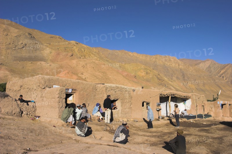 AFGHANISTAN, Ghor Province, Pal-Kotal-i-Guk, Tourists and locals outside Chaikhana(tea house)