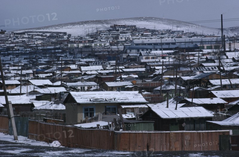 MONGOLIA, Ulan Bator, Snow covered rooftops of housing in city suburbs in winter.