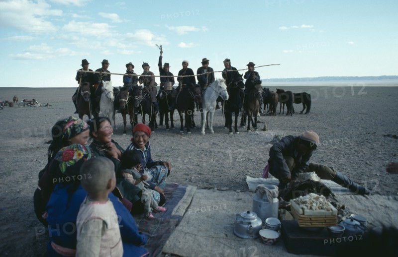 MONGOLIA, South Gobi, Festival, Gathering for ceremony of libation of first mare’s milk of the season.