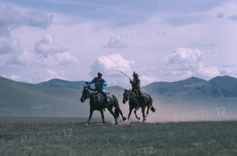 MONGOLIA, Animals, Child jockeys competing in National Day horse race.
