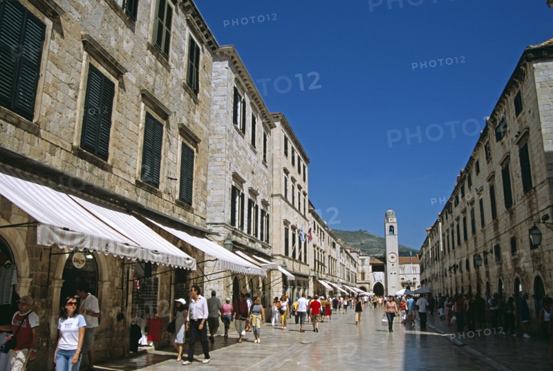 CROATIA, Dalmatian Coast, Dubrovnik, Looking along Stradun to Bell tower (Gradski Zvonik). Former Yugoslavia