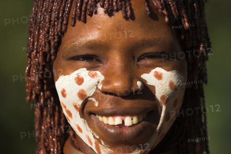 ETHIOPIA, Lower Omo Valley, Mago National Park, "Banna woman, her hair greased with ocher colouring and animal fat into plaits known as Goscha "