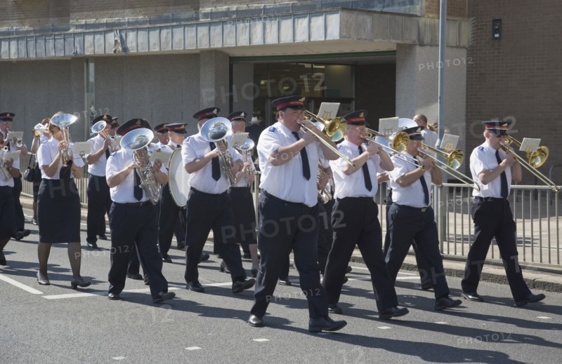 ENGLAND, West Sussex, Worthing, The Salvation Army Band marching along seafront in the summer.
