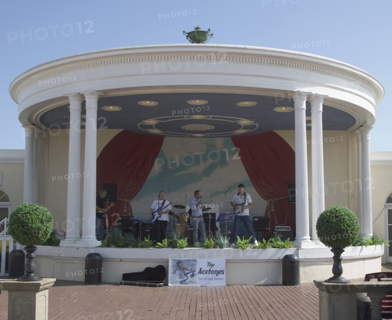 ENGLAND, West Sussex, Worthing, A band playing in the Lido bandstand