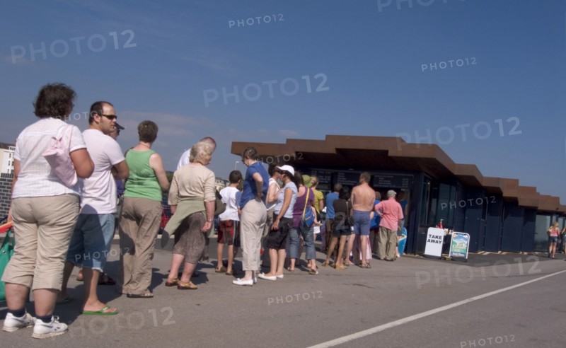 ENGLAND, West Sussex, Littlehampton, Customers queuing at the East Beach Cafe designed by Thomas Heatherwick
