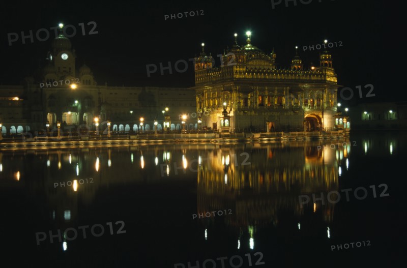 INDIA, Punjab, Amritsar, The Golden Temple illuminated at night