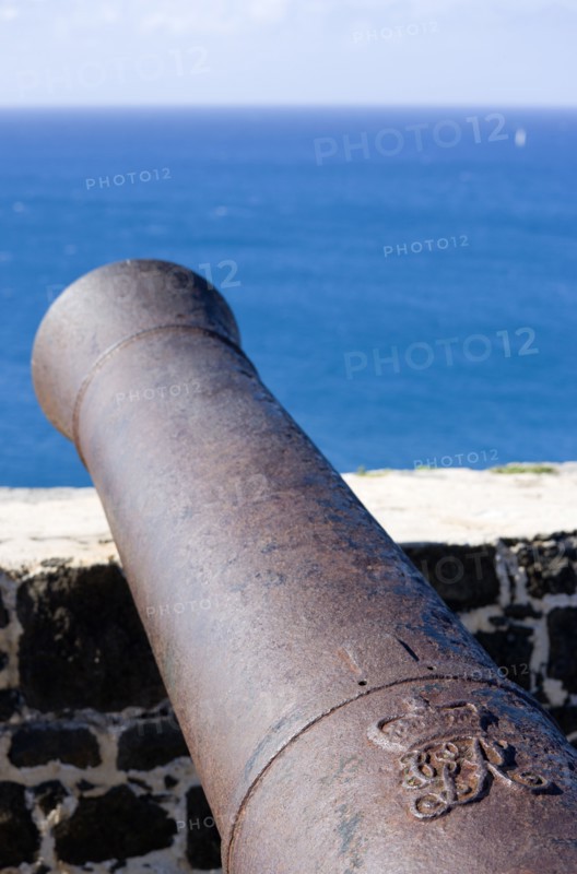 WEST INDIES, St Lucia, Gros Islet , Pigeon Island National Historic Park Cannon at Fort Rodney pointing out to sea