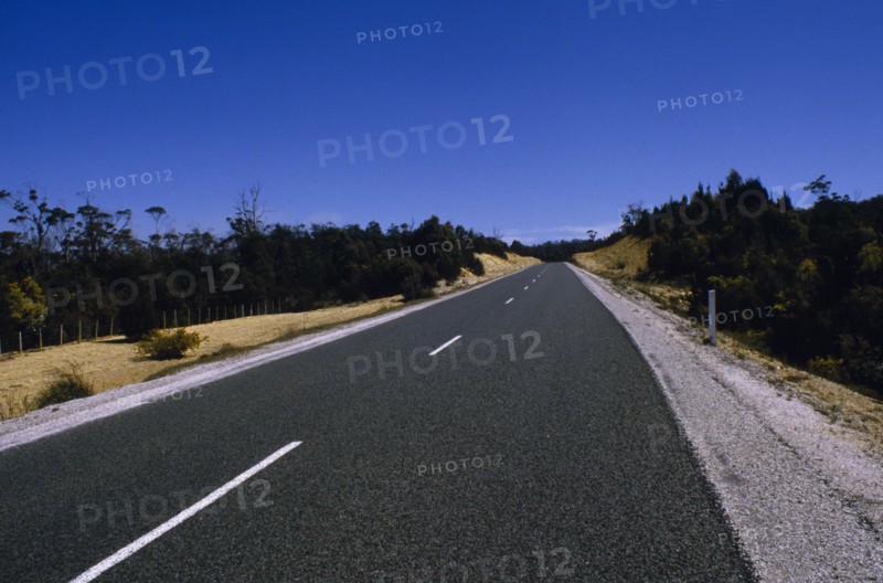 AUSTRALIA, Tasmania, Transport, Deserted tarmac road in the countryside.