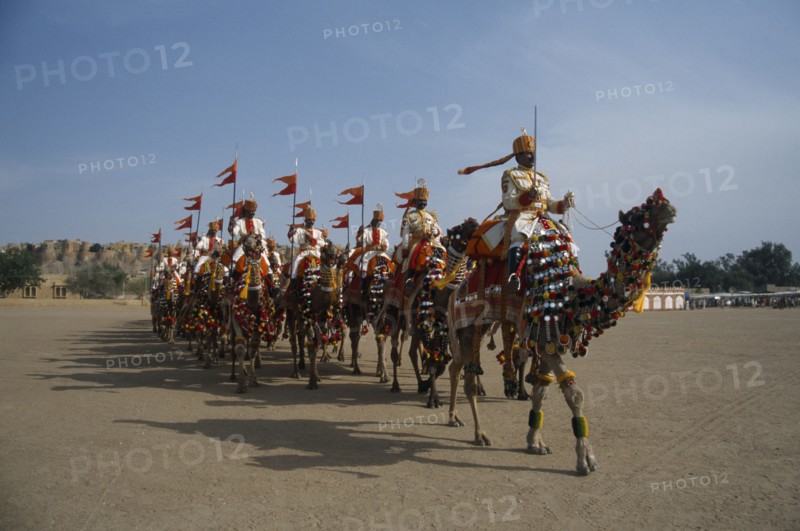 INDIA, Rajasthan, Jaisalmer, Border Security Force soldiers performing the Camel Tattoo at the Desert Festival