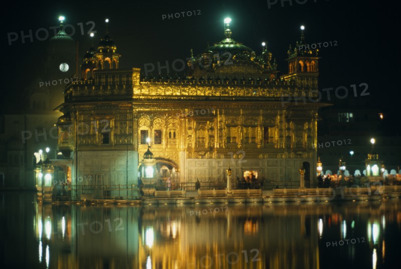 INDIA, Punjab, Amritsar, The Golden Temple illuminated at night