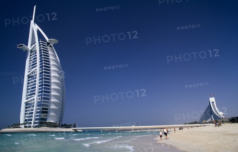 UAE, Dubai , Burj-al-Arab Hotel with the Jumeirah Beach Hotel behind.