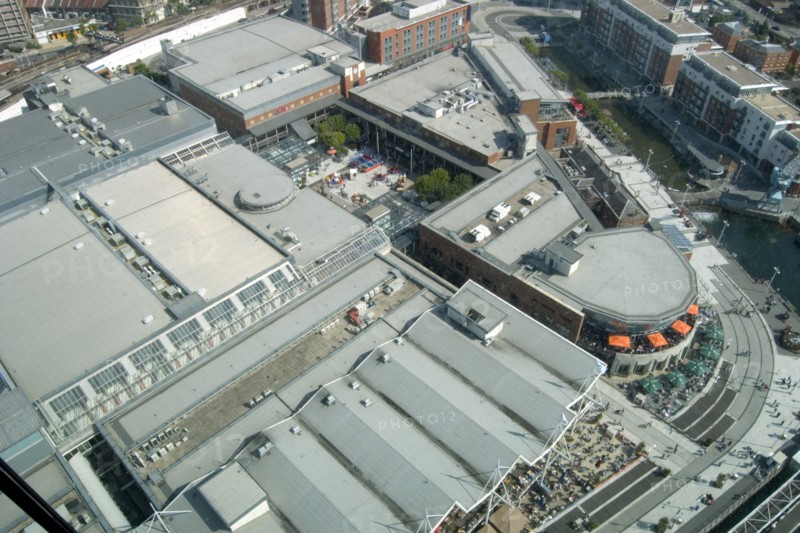 ENGLAND, Hampshire, Portsmouth, Gunwharf Quays. The Spinnaker Tower. Aerial view from observation deck over the rooftops of the whole shopping and restaurant complex